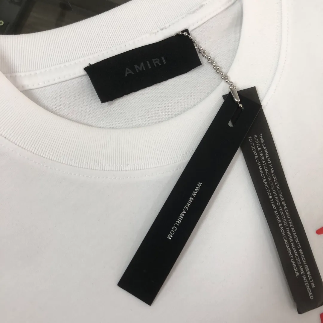 C🌟Amiri 26ss counter Same Style round neck short-sleeved T-shirt ~ Customized suede foam embossed logo craft on the chest! Specially available in custom fabrics! Thick plate three-dimensional! The thicker clothes make the overall breathable and soft texture more prominent, and the full cotton texture makes it extremely comfortable. A must-have item for Premium people, complete with original accessories and accessories! Same Style for men and women! Color: Black White Mint Green Size: XS S M L (larger version! Please state your height and weight when placing an order!)